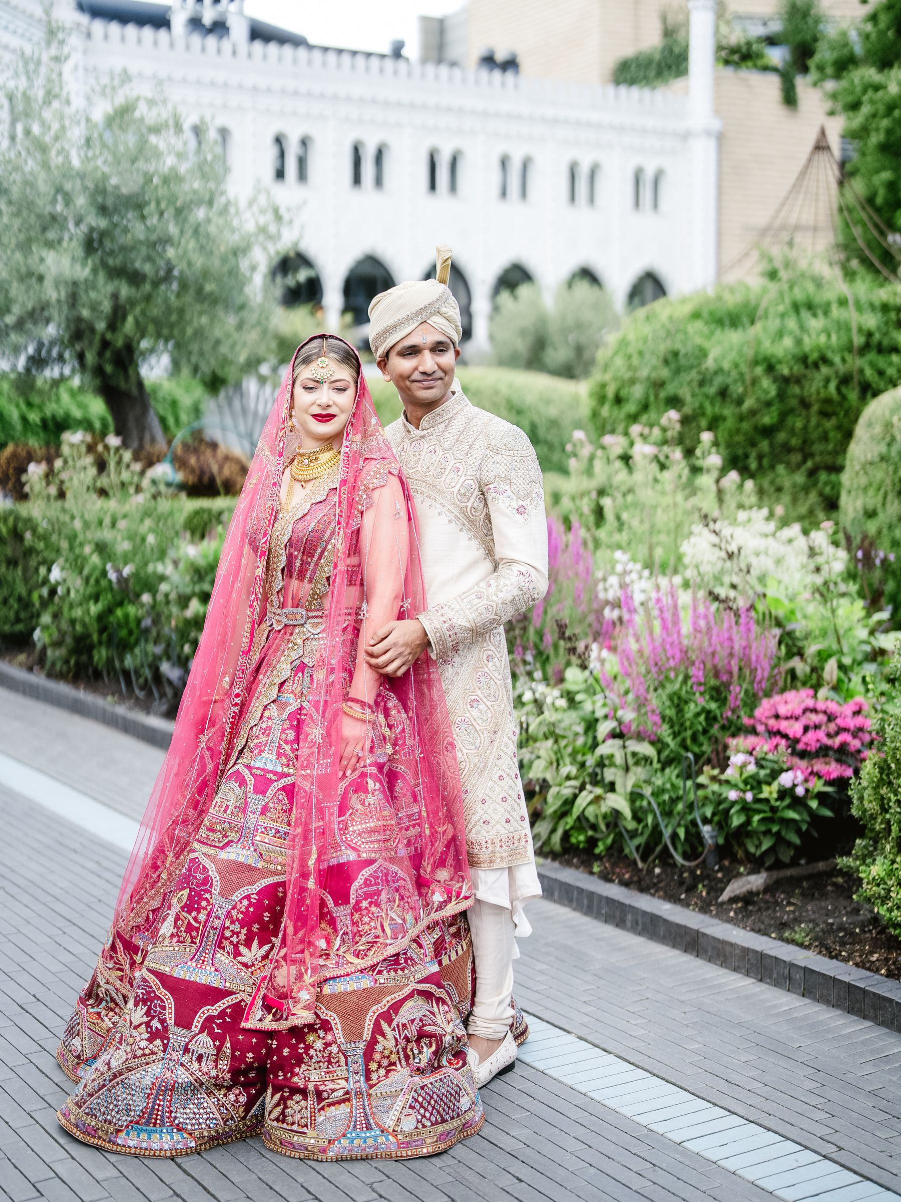 Couple in traditional Indian wedding attire at Tivoli Gardens Copenhagen